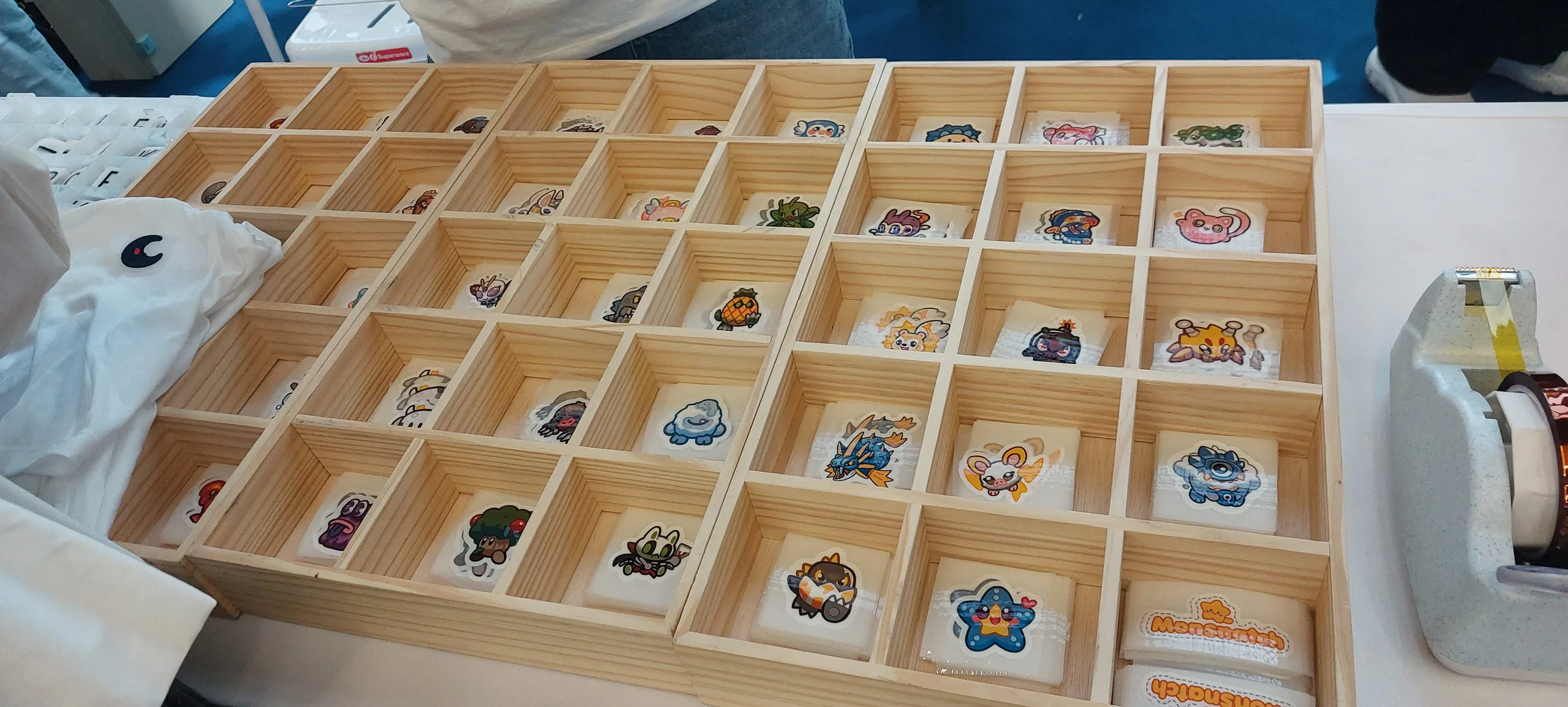Monsnatch character patches arranged for selection at the Bangkok event